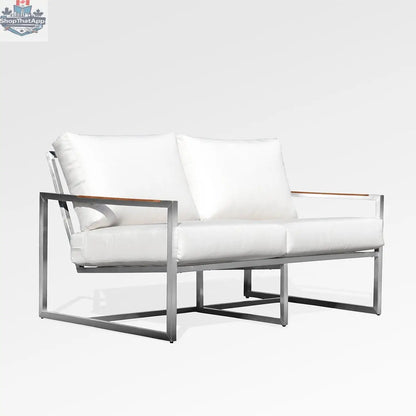 Enclover Acacia loveseat with white Sunbrella cushions, showcasing a durable frame and comfortable seating design.