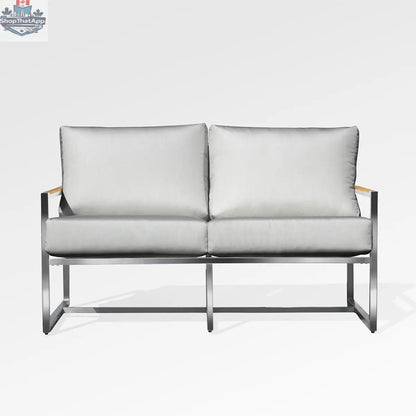 Enclover Acacia loveseat with Sunbrella® cushions, durable frame, and comfortable seating in a natural outdoor setting.