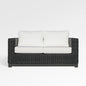 Enclover Trillium loveseat with Sunbrella cushions, stylish outdoor seating with plush comfort and elegant design.