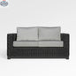 Enclover Trillium loveseat with Sunbrella® cushions, stylish outdoor seating with comfortable, durable fabric in a modern design.