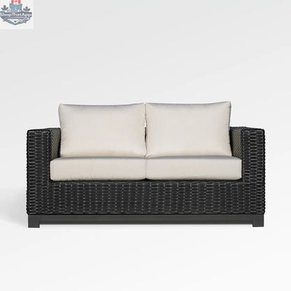 Enclover Trillium loveseat with Sunbrella cushions, showcasing stylish outdoor seating with comfortable, weather-resistant fabric.