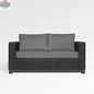 Enclover Trillium loveseat with Sunbrella cushions, stylish outdoor seating with a cozy, inviting design and vibrant fabric details.