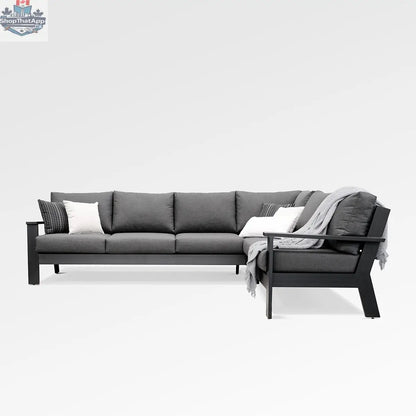 Magnolia black aluminum sectional sofa by Enclover with Sunbrella® cast slate cushions, shown from the front.