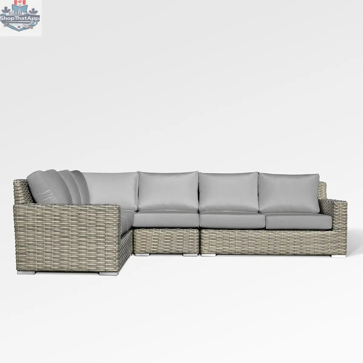 Enclover Jasmine sectional sofa with Sunbrella cushions in granite canvas, showcasing comfortable, stylish seating in a modern living room.
