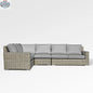 Enclover Jasmine sectional sofa with Sunbrella cushions in granite canvas, showcasing comfortable, stylish seating in a modern living room.