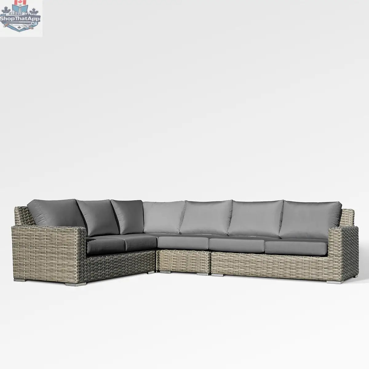 Enclover Jasmine sectional sofa with Sunbrella cushions in Cast Slate fabric, showcasing a stylish and comfortable living room setup.