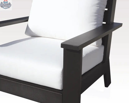 Close-up of Magnolia black aluminum sofa set by Enclover with Sunbrella® cushions, showcasing sleek design and comfortable seating.