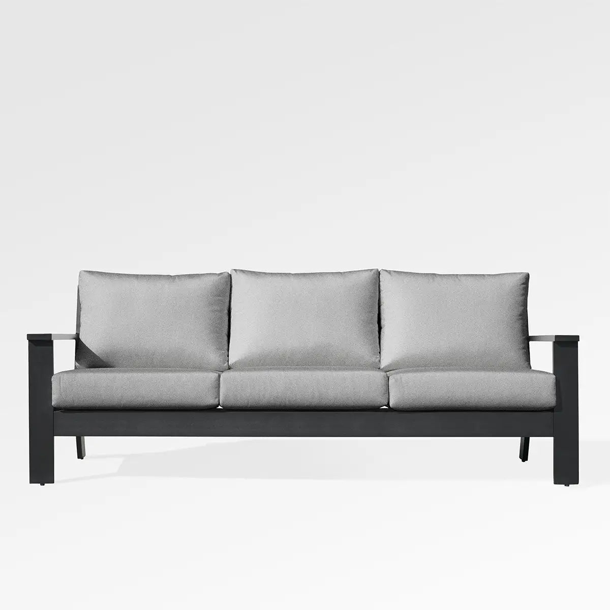 Magnolia black aluminum sofa set by Enclover with Sunbrella® cushions in granite canvas, modern outdoor seating arrangement.