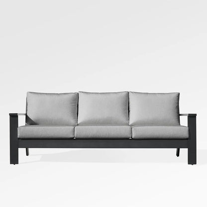 Magnolia black aluminum sofa set by Enclover with Sunbrella® cushions in granite canvas, modern outdoor seating arrangement.