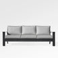 Magnolia black aluminum sofa set by Enclover with Sunbrella® cushions in granite canvas, modern outdoor seating arrangement.