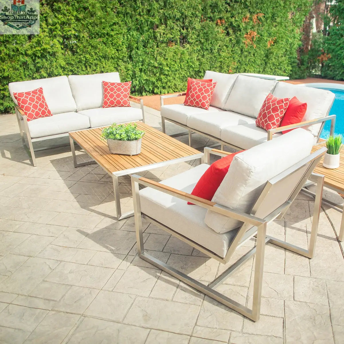 Enclover Acacia conversational sofa set with Sunbrella® cushions, featuring outdoor seating and plush cushions in a stylish patio setting.