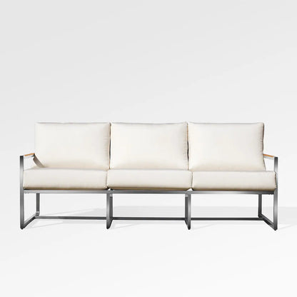 Enclover Acacia outdoor sofa with Sunbrella cushions, showcasing stylish design and comfortable seating for outdoor spaces.