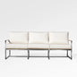 Enclover Acacia outdoor sofa with Sunbrella cushions, showcasing stylish design and comfortable seating for outdoor spaces.