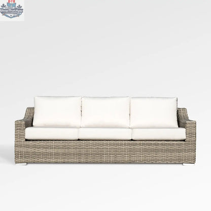 Enclover Tulip outdoor sofa with Sunbrella cushions, featuring a modern design and plush seating for outdoor comfort