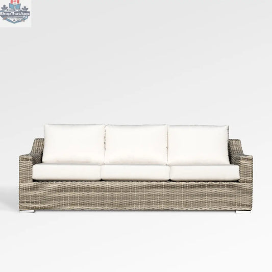 Enclover Tulip outdoor sofa with Sunbrella cushions, featuring a modern design and plush seating for outdoor comfort