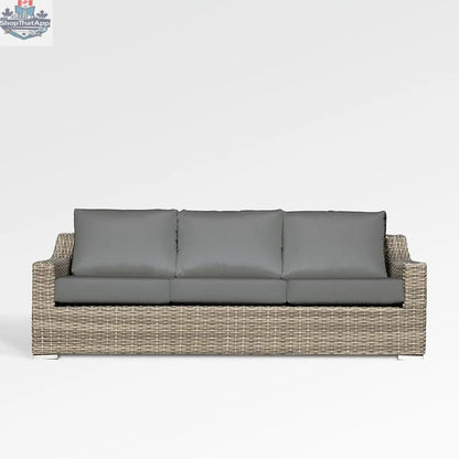 Enclover Tulip sofa with Sunbrella cushions, showcasing outdoor comfortable seating with stylish design and plush cushions.
