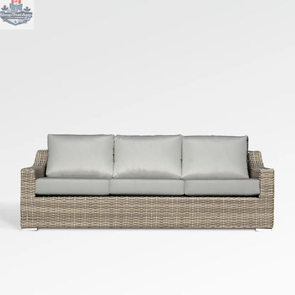 Enclover Tulip sofa with Sunbrella cushions, showcasing a stylish outdoor seating solution with plush cushions and modern design.
