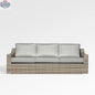 Enclover Tulip sofa with Sunbrella cushions, showcasing a stylish outdoor seating solution with plush cushions and modern design.