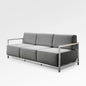 Enclover Acacia Lux sofa with Sunbrella® cushions, featuring a modern design and plush seating for outdoor relaxation.