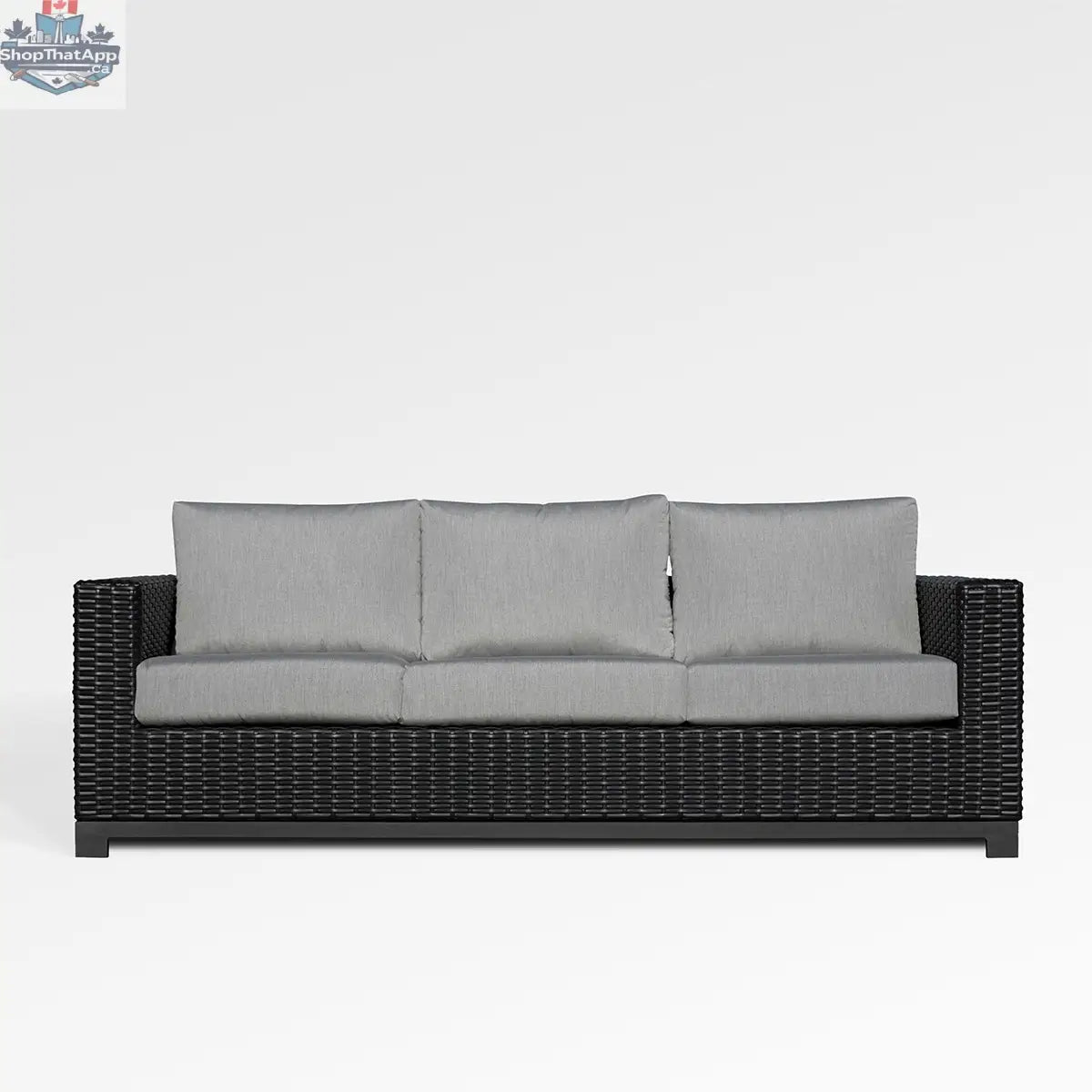 Enclover Trillium sofa with Sunbrella cushions, showcasing a stylish and comfortable living room furniture piece.