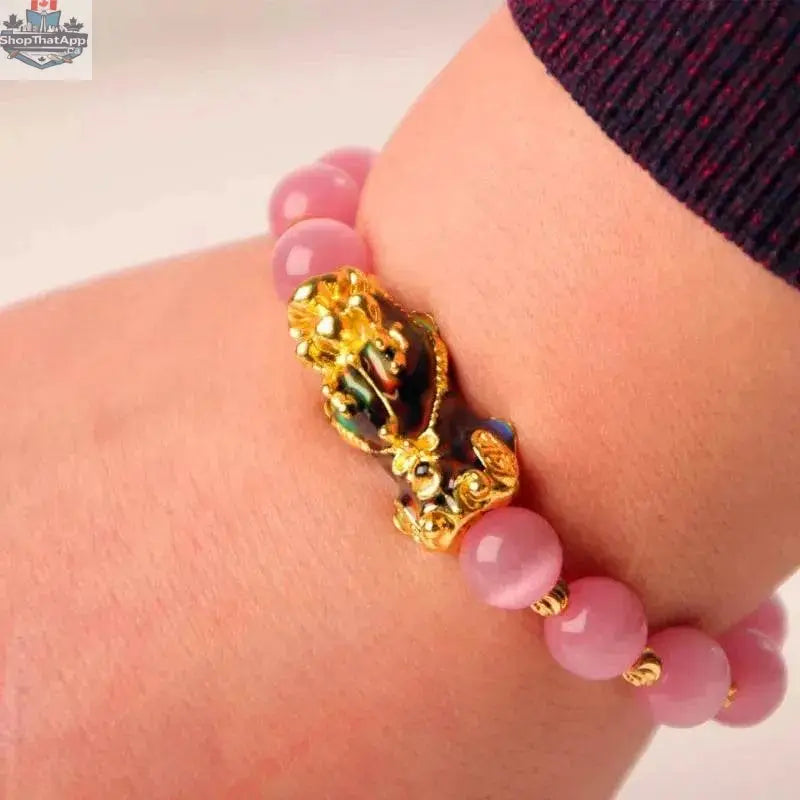 Gold plated PiXiu bracelet with crystal beads, stylish 3D design, elegant jewelry accessory from EX-STOCK Canada.