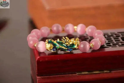 Gold plated PiXiu bracelet with 3D design and crystal beads, stylish jewelry accessory from EX-STOCK Canada.