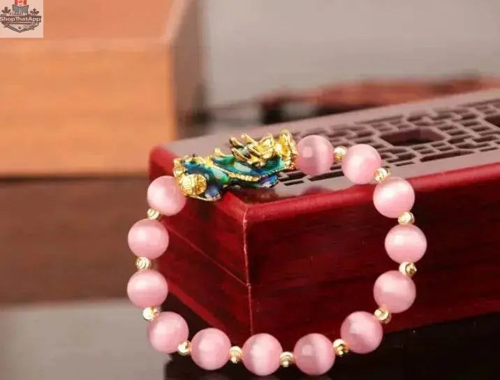 Gold plated PiXiu bracelet with crystal beaded design, featuring intricate 3D craftsmanship for a stylish jewelry piece.