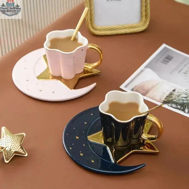 Four ceramic coffee cups with star and moon saucers in a creative design from EX-STOCK Canada.