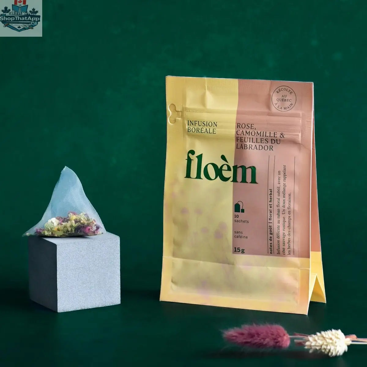 Bouquet of rose and chamomile herbal tea sachets from Floèm with dried rose and chamomile leaves for relaxation.