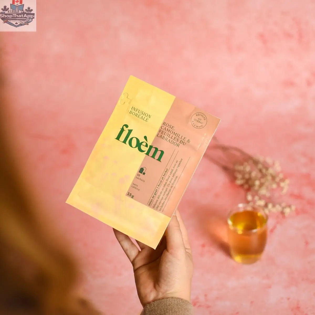 Floèm Tisane Rose Camomille infusion in tea sachets with dried rose petals and chamomile leaves for relaxation and wellness.