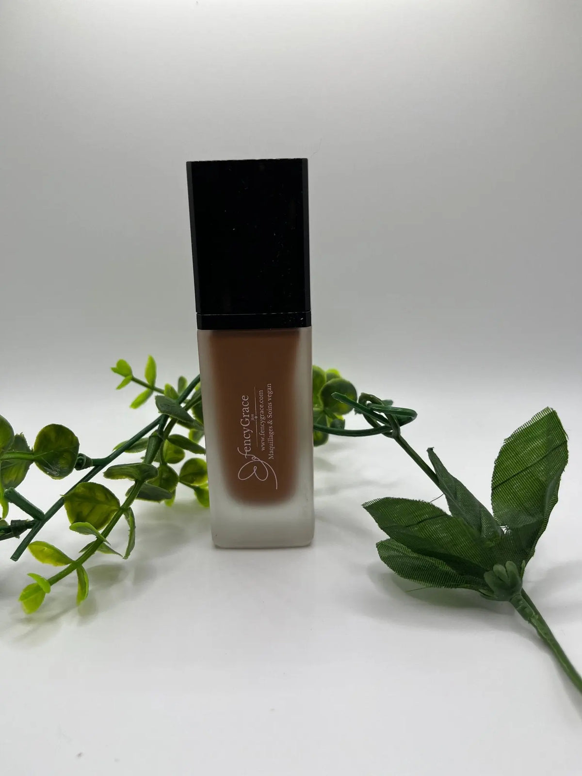 Vegan hydrating liquid foundation Miriam 101 by FencyGrace, high-end beauty makeup product for flawless skin.