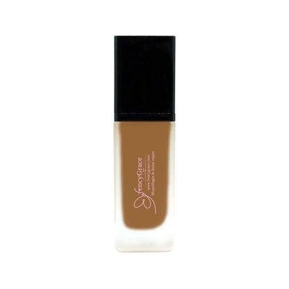 Vegan hydrating foundation by FencyGrace with a luminous finish, available in multiple shades, shown in a sleek makeup bottle.