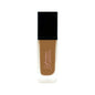 Vegan hydrating foundation by FencyGrace, high-end makeup product, showing a compact with the fond de teint in a sleek container.