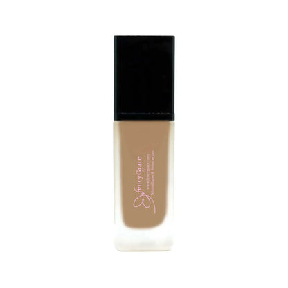 Vegan hydrating foundation by FencyGrace with luminous finish in multiple shades, displayed in a sleek tube with applicator.