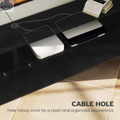 Black Jesse floating TV stand by SLOTH Nation with 71-inch length, two fluted flip-down doors, suitable for TVs up to 75 inches.