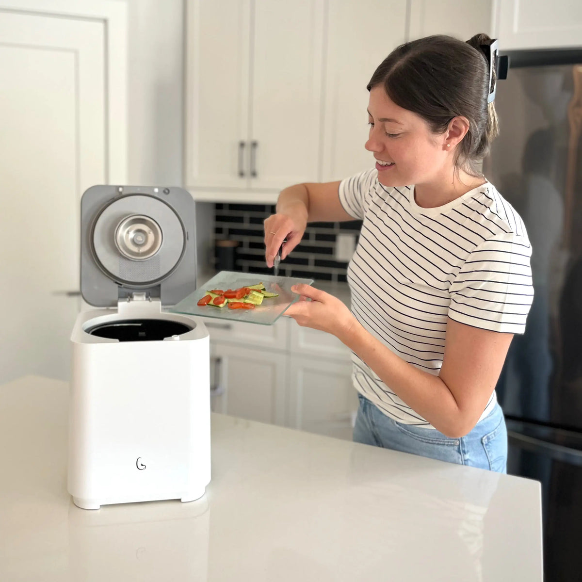 Green Experience GE Kitchen Composter for kitchen waste composting, made of durable materials with a sleek design.