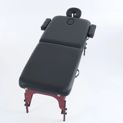 Greenlife Calgary 4-inch thick 2-section wooden portable massage table in black and cream, designed for professional massage therapy.