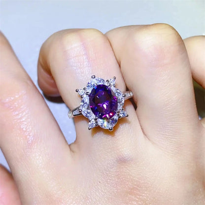 Sterling silver 2 carat moissanite ring with a sparkling central stone, elegant jewelry from harry'zBOUTIQUE