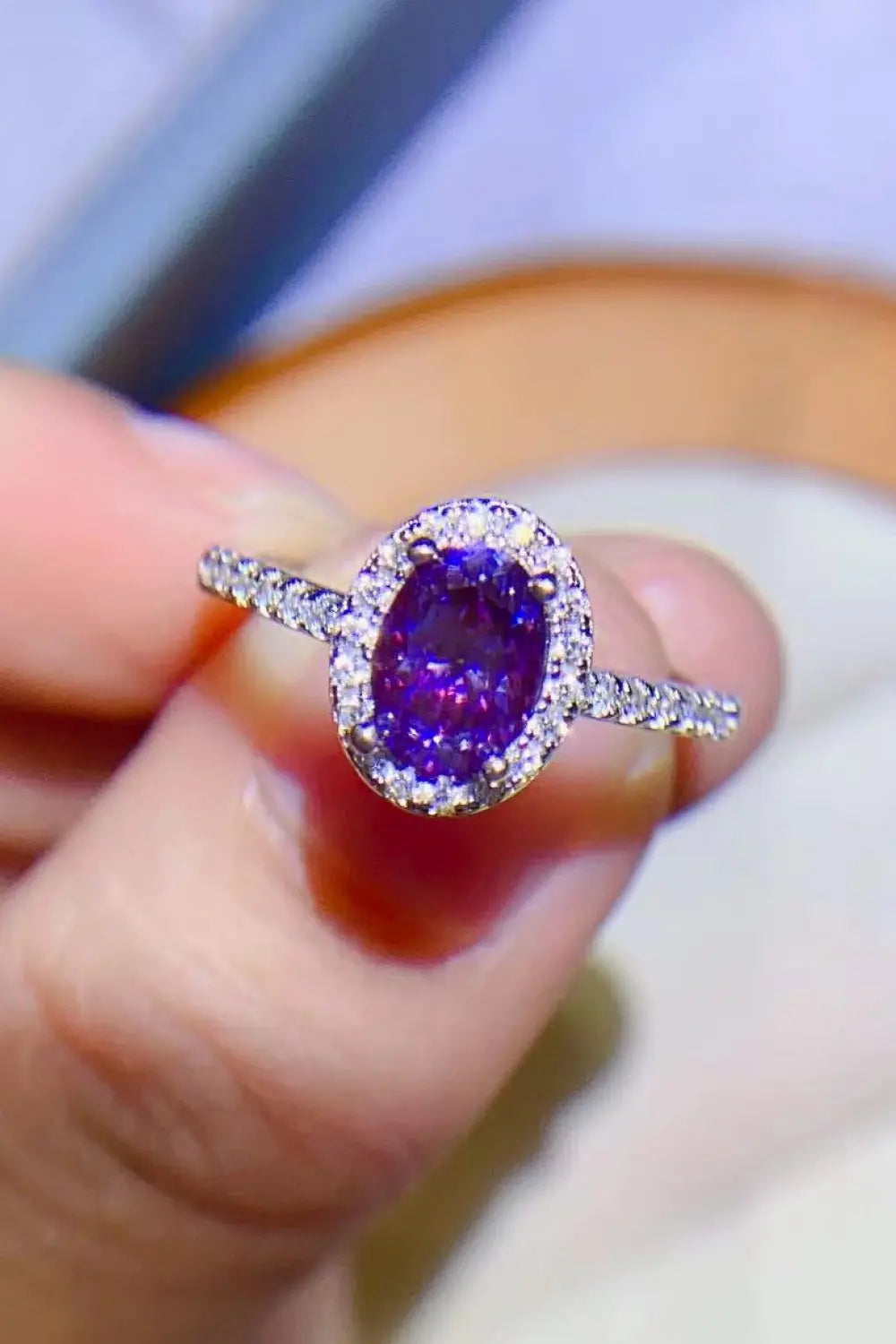 925 Sterling Silver purple moissanite ring with 1 carat center stone, showcasing a sparkling, elegant design.