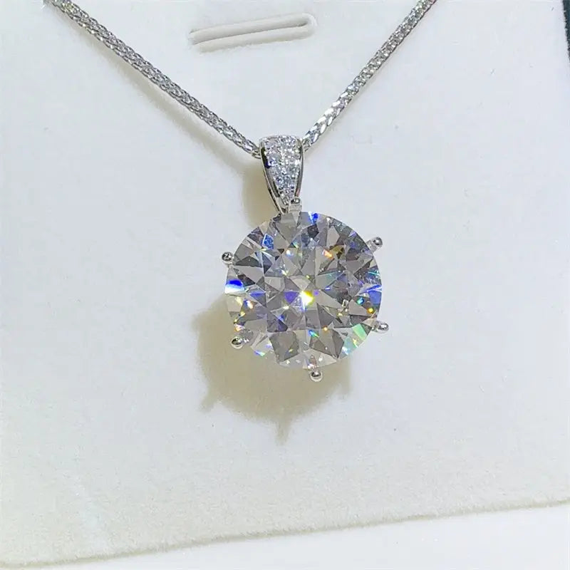 Sterling silver 10 carat moissanite necklace with pendant design, showcasing sparkling gemstone and elegant jewelry craftsmanship