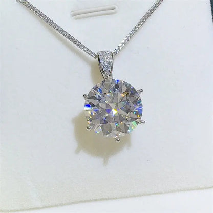 Sterling silver 10 carat moissanite necklace with pendant design, showcasing sparkling gemstone and elegant jewelry craftsmanship