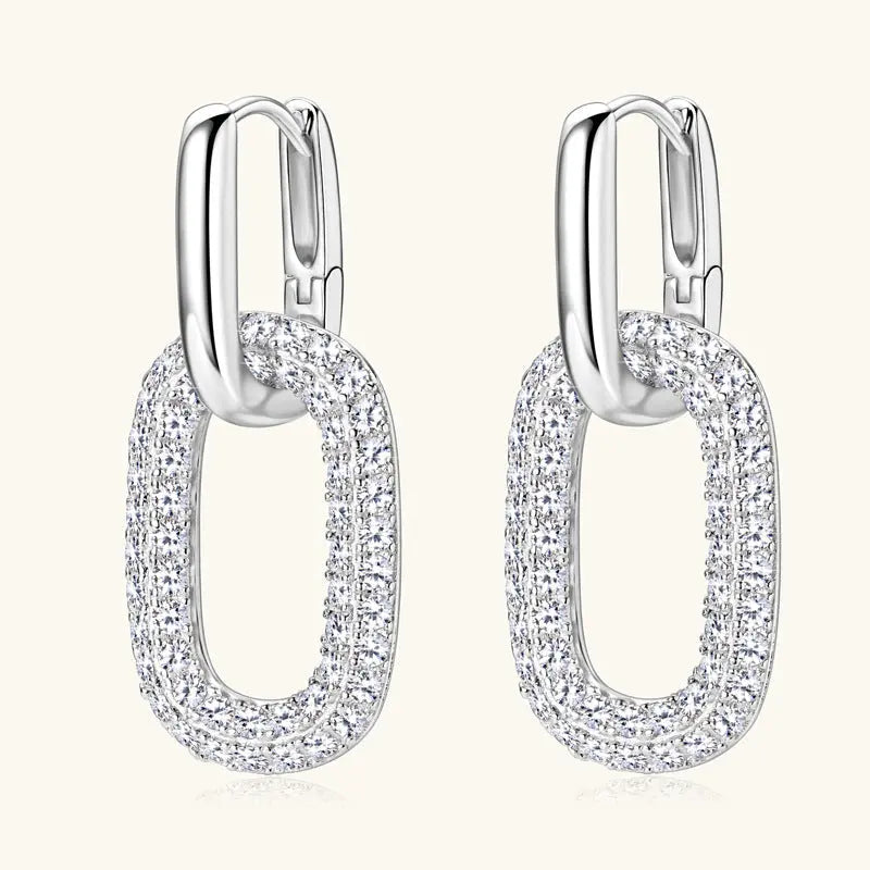 Sterling silver earrings with 2.16 carat moissanite stones, elegant jewelry from harry'zBOUTIQUE featuring sparkling gemstone accents.