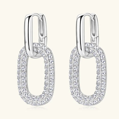 Sterling silver earrings with 2.16 carat moissanite stones, elegant jewelry from harry'zBOUTIQUE featuring sparkling gemstone accents.