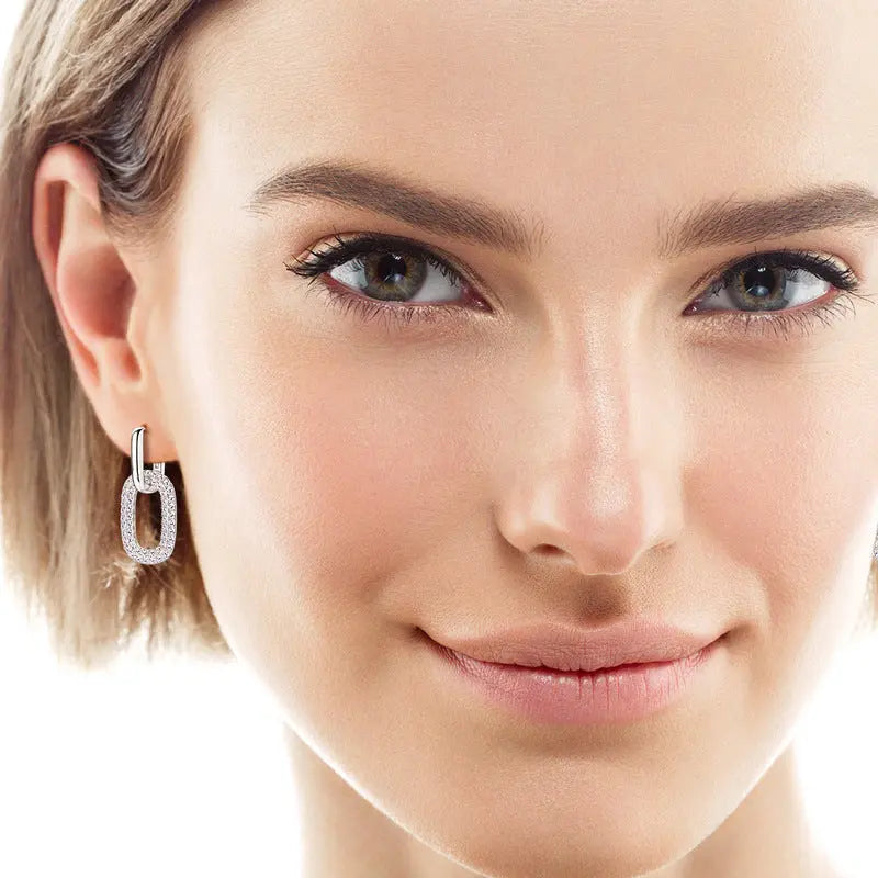 Elegant 2.16 carat moissanite silver earrings in 925 sterling silver with sparkling stones and a classic design.
