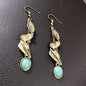 Turquoise alloy leaf earrings with elegant leaf design, perfect for stylish accessories from harry'zBOUTIQUE.