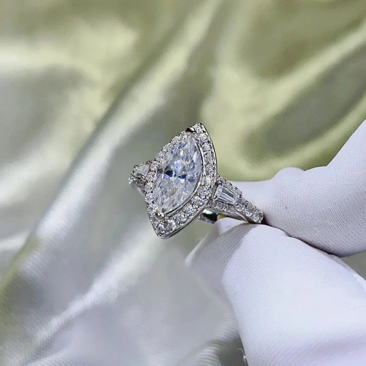 Sterling silver 2 carat moissanite ring with detailed band design, elegant jewelry piece from harry'zBOUTIQUE