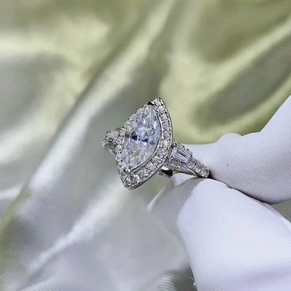 Sterling silver 2 carat moissanite ring with detailed band design, elegant jewelry piece from harry'zBOUTIQUE