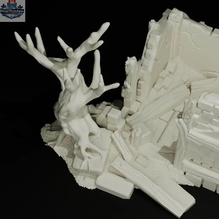 Wargaming terrain model of ruined storehouse from Misty Hollow by Hawk Collectibles, featuring weathered stone walls and broken roof.