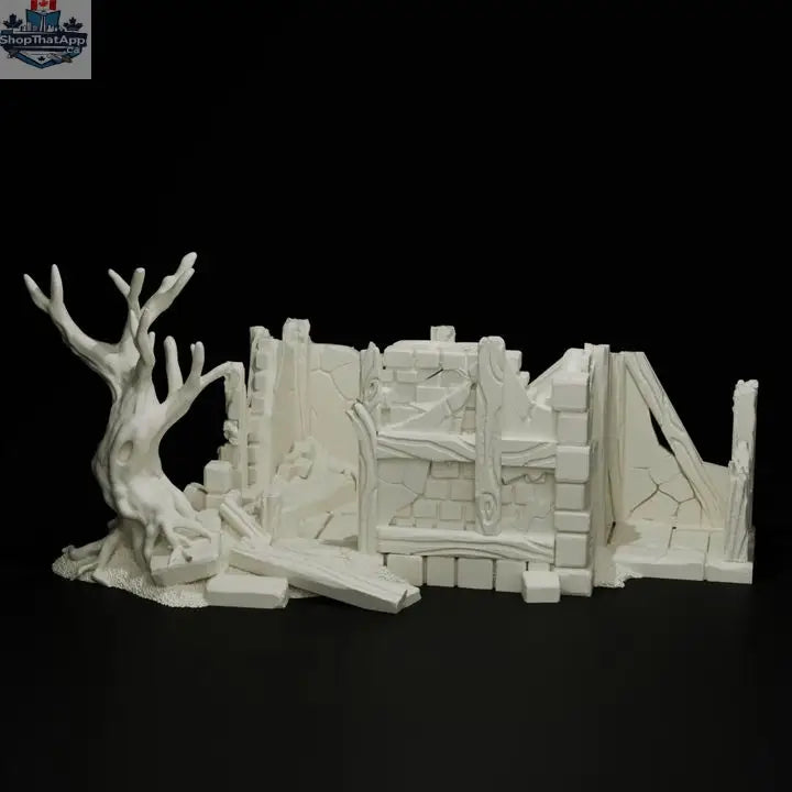 Wargaming terrain model of ruined storehouse in Misty Hollow by Hawk Collectibles, featuring detailed crumbling walls and weathered structure.