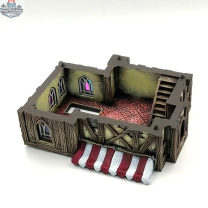 Detailed view of Hawk Collectibles' medieval fantasy merchant's house wargaming terrain in Misty Hollow, showing painted miniature building.